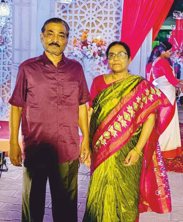 With his wife at a function