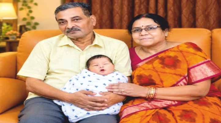 With his wife and a grandchild